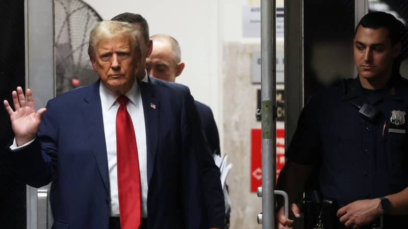 NEW YORK, NEW YORK - APRIL 25: Former President Donald Trump enters Manhattan Criminal Court for the continuation of his hush money trial on April 25, 2024 in New York City. Former U.S. President Donald Trump faces 34 felony counts of falsifying business records in the first of his criminal cases to go to trial.  (Pool Photo by Spencer Platt/Getty Images)